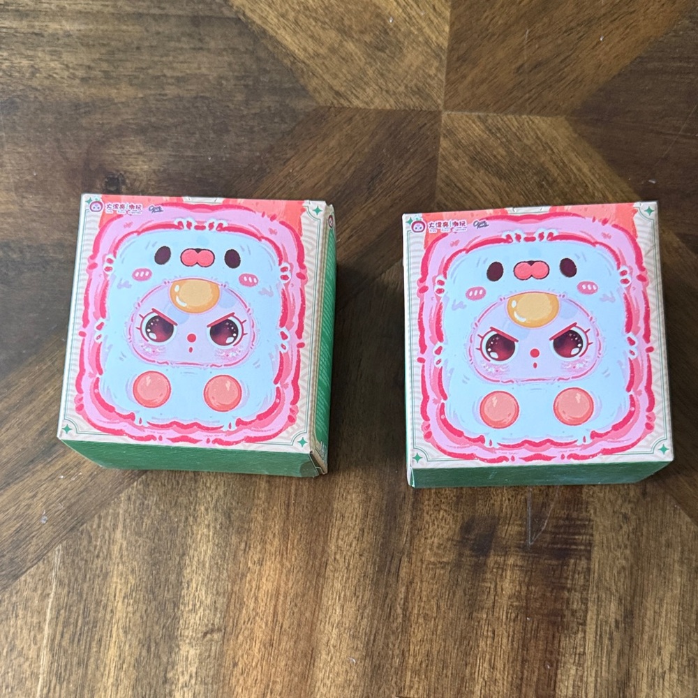 Adorable Plush Toy with Pink and Green Accents